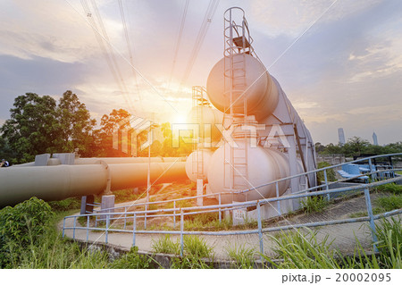 Oil and gas industry refinery factory at sunset 20002095