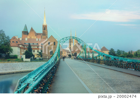 Wroclaw Tumski Island bridge, vivid sunset Wroclaw Tumski Island bridge, vivid sunset 20002474