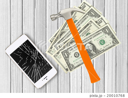 Modern broken mobile phone, hammer and dollars 20010768