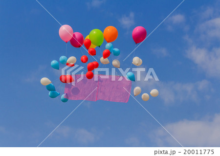 Flying balloons banner in blue sky background 20011775