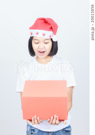 young attractive asian girl in Santa hat and red gift box 20013856