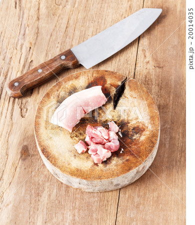 Raw fresh uncooked Pork meat on cutting chopping board block on 20014035