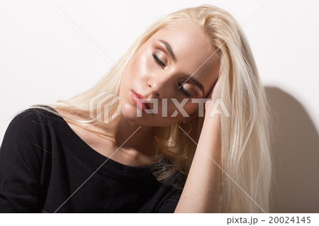 Portrait of the blonde on a white background 20024145