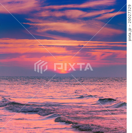 Sunset over sea with dramatic beautiful sky 20027329