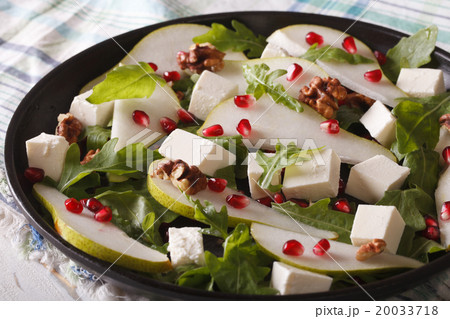 salad with pears, pomegranates, cheese, nuts  20033718