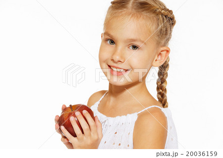 Charming girl with an apple Charming girl with an apple 20036159