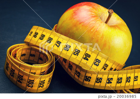apple with yellow measuring tape apple with yellow measuring tape 20036985