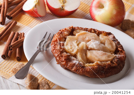 Dutch baby pancake with apples on the table Dutch baby pancake with apples on the table 20041254