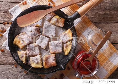Kaiserschmarrn with plum sauce closeup on a pan 20041444