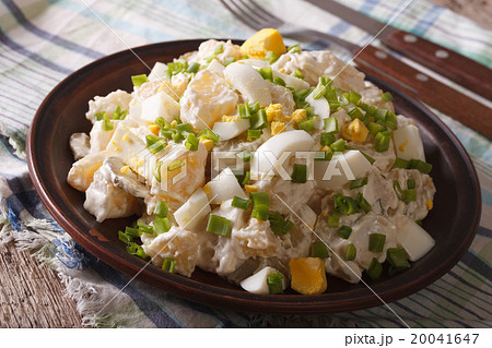 Salad of potatoes, egg, green onion and mayonnaise Salad of potatoes, egg, green onion and mayonnaise 20041647