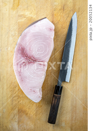 Sword Fish Steak on Wooden Board 20052134