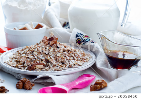 Oatmeal porridge with glass of milk Oatmeal porridge with glass of milk 20058450