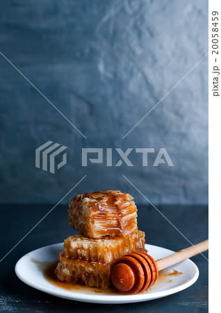 Fresh honey with honeycomb Fresh honey with honeycomb 20058459
