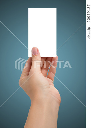 Hand holding white blank business visit card, gift 20059187