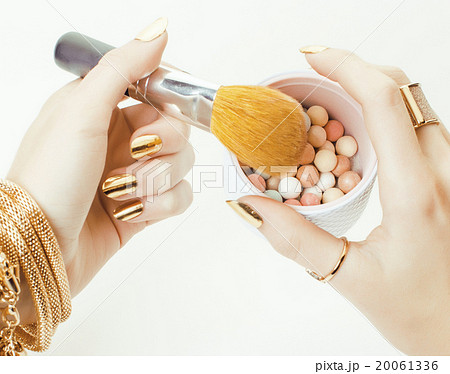 woman hands with golden manicure and many rings woman hands with golden manicure and many rings 20061336
