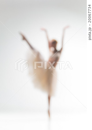 Blurred silhouette of ballerina on white Blurred silhouette of ballerina on white 20067734