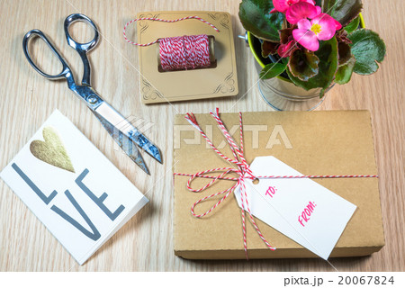 Gift box,cards,Begonia on the wooden background Gift box,cards,Begonia on the wooden background 20067824