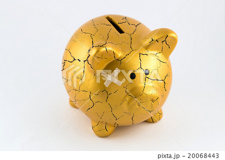 Concept of broken gold piggy bank 20068443