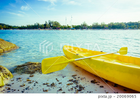 Colorful yellow kayaks on beach in Andaman sea 20069065