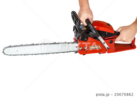 Gasoline chain saw in hand. 20070862