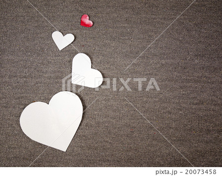 white and red painted paper hearts on grey canvas white and red painted paper hearts on grey canvas 20073458
