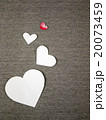 white and red painted paper hearts on grey canvas 20073459