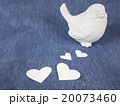 white paper hearts and bird doll on denim 20073460