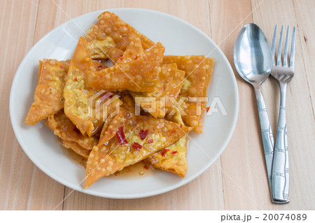 Delicious Fry dumpling crispy pour by spicy sauce 20074089