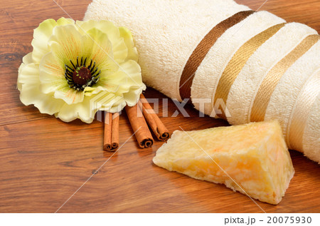 Handmade soap, cinnamon sticks and bath towel  20075930
