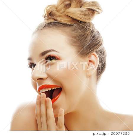 young blond woman with bright make up smiling 20077236