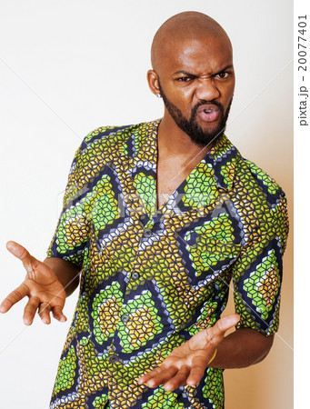 portrait of young handsome african man wearing 20077401