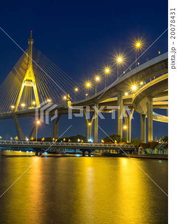 Bhumibhol bridges over river in evening period 20078431
