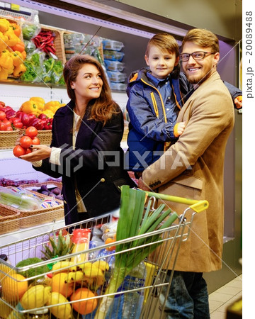 Young family in a grocery store Young family in a grocery store 20089488