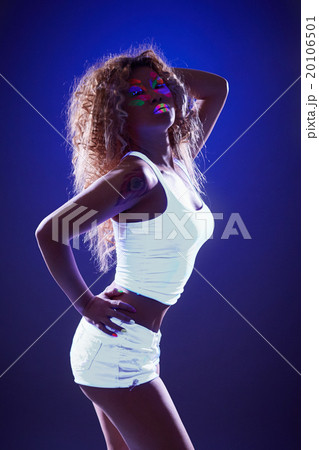 Spectacular slim girl posing in ultraviolet 20106501