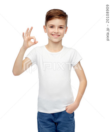 happy boy in white t-shirt showing ok hand sign 20108909