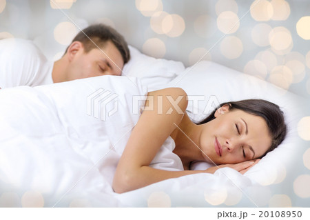 happy couple sleeping in bed happy couple sleeping in bed 20108950
