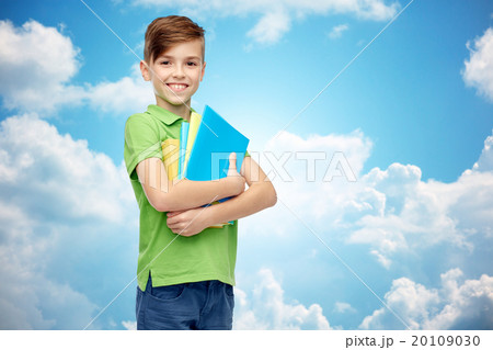 happy student boy with folders and notebooks happy student boy with folders and notebooks 20109030