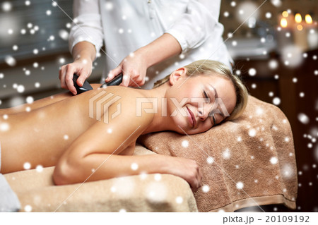 close up of woman having hot stone massage in spa close up of woman having hot stone massage in spa 20109192