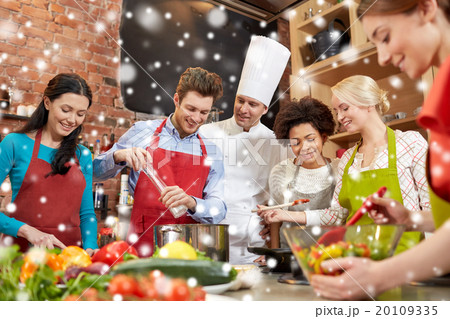 happy friends and chef cook cooking in kitchen happy friends and chef cook cooking in kitchen 20109335