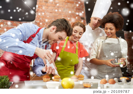 happy friends and chef cook baking in kitchen 20109787