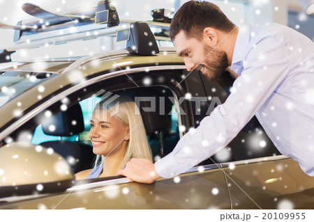 happy couple buying car in auto show or salon happy couple buying car in auto show or salon 20109955