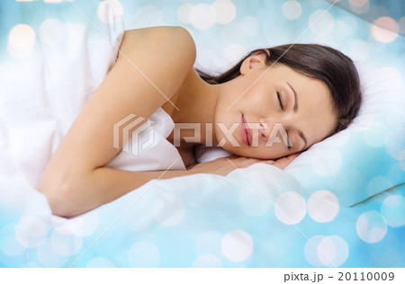 beautiful woman sleeping in bed 20110009