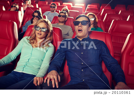 friends watching horror movie in 3d theater 20110361