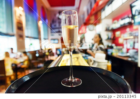 glass of champagne in cafe 20113345