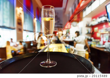 glass of champagne in cafe 20115489