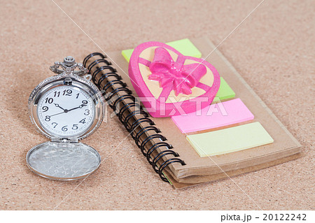 Pocket watch , heart and note book on  background 20122242