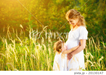 happy family,  pregnant mother and daughter little child in summ 20130147