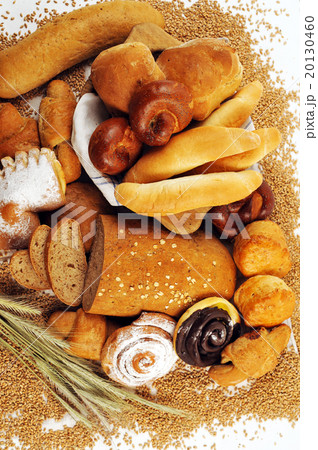 Composition with bread and rolls in wicker basket 20130460
