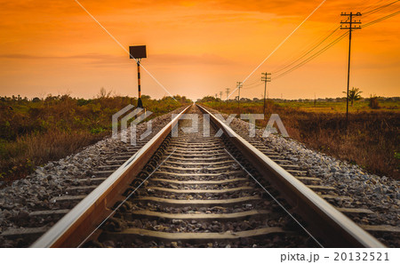 Railway Track in a Rural Scene at Sunrise Time. Railway Track in a Rural Scene at Sunrise Time. 20132521