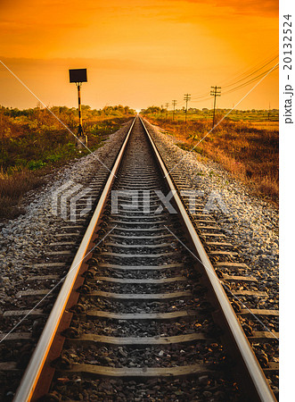 Railway Track in a Rural Scene at Sunrise Time. Railway Track in a Rural Scene at Sunrise Time. 20132524